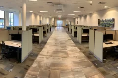 a modern, eco-friendly office space filled with refurbished, sleek cubicles in orlando.